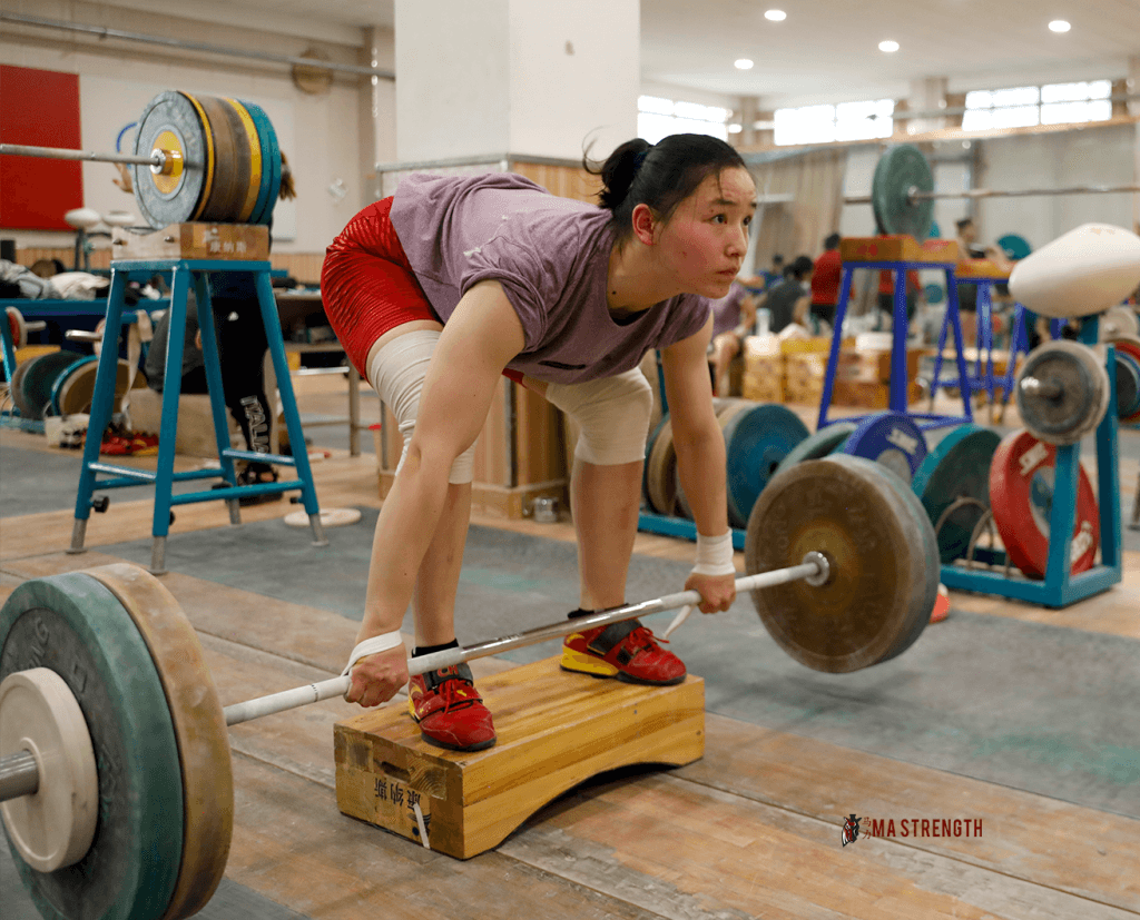 Sumo Deadlift High Pull: Improve Technique for Round Glutes & Delts!